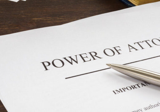 Power of attorney POA legal document and pen.